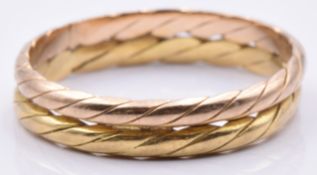 An 18ct gold bi-coloured rope twist ring, 2.2g, size K