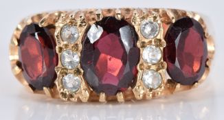 A 9ct gold ring set with three oval garnets and cubic zirconia, 5.0g, size Q/R