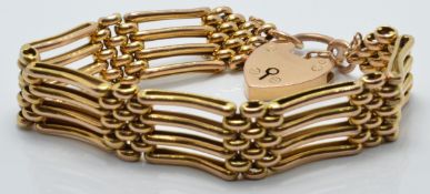 A 9ct gold gate bracelet, 21.7g