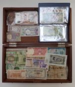 An amateur collection of UK and overseas banknotes to include O'Brien £5 CO1 487877, Isle of Man ten