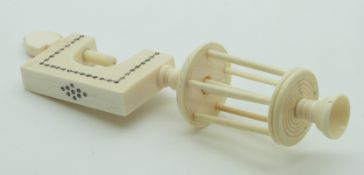 A 19thC Indian Madras ware ivory sewing / needlework pin cushion clamp with winder, height 14cm
