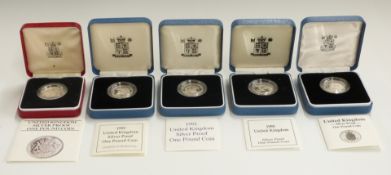 Five Royal Mint silver proof £1 coins, 1983, 1988, 1990, 1991 and 1992, all cased with certificates