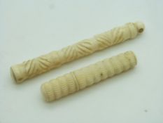 Two 19thC turned ivory needle cases including a stanhope for Ilfracombe, longest 11cm
