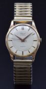 Cobana 18ct gold gentleman's wristwatch with gold dauphine hands and hour markers, engine turned and