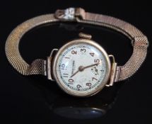 Waltham 9ct gold ladies wristwatch with inset subsidiary seconds dial, gold hands and Arabic