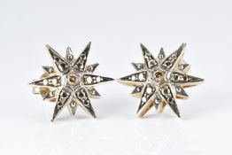 A pair of 18ct gold noble earrings set with a diamond to each, by H Stern