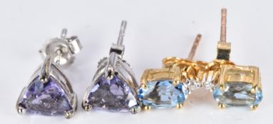 A pair of 9ct gold earrings set with trilliant cut blueberry quartz and a pair of 9ct gold