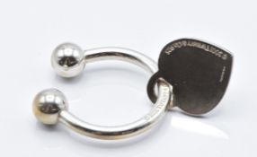 A Tiffany key ring with a silver hallmarked heart pendant, in original box