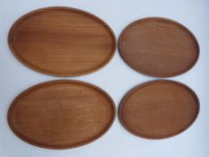 Three Dennis French Arts and Crafts style carved wood oval bowls, width 29cm