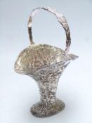 Silver plated basket, all over repoussé decoration of Watteau scenes, height 38cm