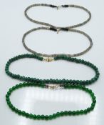 Two quartz necklaces and two labradorite necklaces