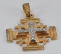 An 18k gold cross pendant set with diamonds engraved Jerusalem verso, 4.1g