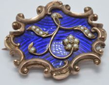 Victorian mourning brooch set with blue guilloché enamel, seed pearls and a diamond, verso a glass