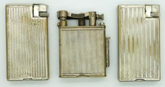 Three various Dunhill petrol lighters