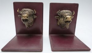Asprey pair of bookends with plated bull's head decoration, with Asprey London impressed to base,