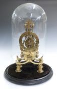 A brass skeleton clock with single fusee movement and Roman dial, under a glass dome, H32cm