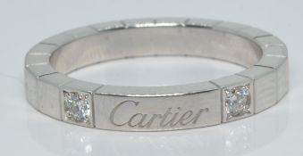 Cartier Lanieres 18ct white gold ring set with two round cut diamonds, 6.2g, size M/N