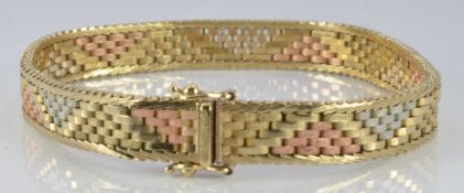 A 9ct gold tri-coloured bracelet, 16.1g