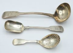 Three Georgian and later fiddle pattern hallmarked silver items of cutlery, two being Irish,