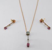 A 9ct gold necklace and earrings set with rubies and diamonds, 4.8g