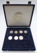 Westminster coin collection case containing seven coins comprising three George III crowns, two