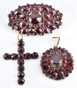 Two Victorian pendants and a brooch set with Bohemian cut garnets, 2 x 3.5cm