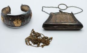A hallmarked silver purse and a silver and 18ct gold bangle