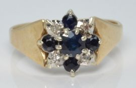 A 9ct gold ring set with sapphires and diamonds, 3.6g, size O