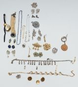 A collection of jewellery including a silver and moonstone ring, a silver necklace, silver