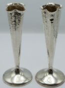 Arts and Crafts pair of hallmarked silver quatrefoil shaped hammered vases, Birmingham 1902, maker