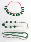 A collection of necklaces including quartz, emerald and jade, labradorite etc