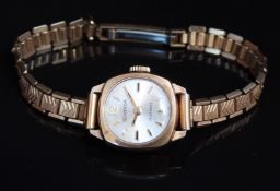 Sekonda 9ct gold ladies wristwatch with gold hands and baton markers, silver dial and 17 jewel