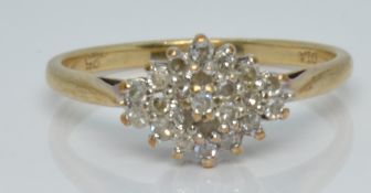 A 9ct gold ring set with diamonds totalling approximately 0.25ct, 2.2g, size P