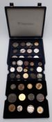 Westminster case containing a collection of medallic coins etc