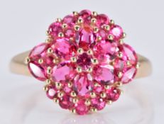 A 9ct gold ring set with pink sapphires in a cluster, 3.3g, size O
