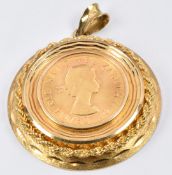 An 18ct gold pendant set with a 1966 gold full sovereign, 19g