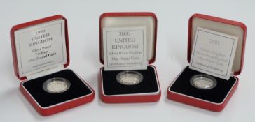 Three Royal Mint silver proof Piedfort £1 coins, 1999, 2000 and 2001, all cased with certificates