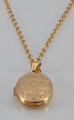 A 9ct gold necklace and 9ct gold locket, 7.5g