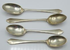 Four Goldsmiths & Silversmiths Co Ltd hallmarked silver dog nose style tea and coffee spoons, London