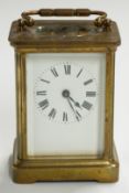 Late 19th/ early 20thC brass carriage clock with Roman enamelled dial, 'Leo' stamp to back plate and