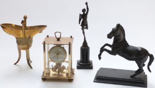 A bronze classical figurine on plinth, cast metal horse, Chinese brass tripod censer and a clock,