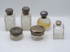 Victorian pair of Walker & Hall hallmarked silver lidded cut glass bottles, Birmingham 1900,