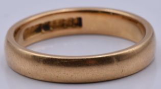 A 22ct gold wedding band/ ring, 5.2g, size N