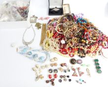 A collection of costume jewellery including diamanté, silver pendants, vintage earring, beads etc