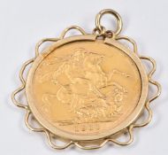 A 9ct gold pendant set with a 1911 gold full sovereign, 9.7g