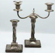 Pair of Victorian hallmarked silver candlesticks with wrythen column stems and embossed