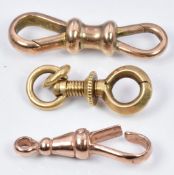 A 9ct gold clip (1.9g), a yellow metal clip (1.7g) and one other