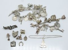 Two silver charm bracelets, brooch etc (116g)