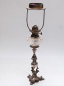 Silver plated and cut glass oil lamp with fish supports, seahorse decoration and Hinks burner,