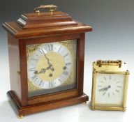 An oak cased three train mantel clock marked 'Woodford' to dial and a Smith's carriage clock,